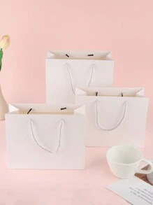 1pc/6pcs/12 Pcs Simple Gift Bags, New - Style Gift Packaging Bags, Clothes Gift Handbags, Portable Hand - Held Kraft Paper Bags - White - View 5