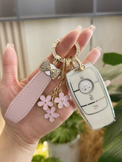 TTOBS 1 pezzo Elegante portachiavi in pelle con pendente floreale, multifunzionale e alla moda per donne, in vari colori, accessorio perfetto per i proprietari di auto, idea regalo di stile