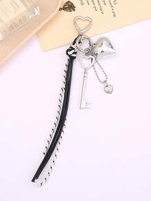 Llavero con colgante de corazón, accesorios para llaves con cordón trenzado de colores múltiples, artículos creativos, colgante de corazón de metal, llavero de equipaje, accesorios para cordones, colgante con borla y hebilla con forma de corazón, colgante para teléfono móvil