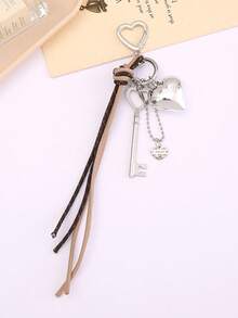 Llavero con colgante de corazón, accesorios para llaves con cordón trenzado de colores múltiples, artículos creativos, colgante de corazón de metal, llavero de equipaje, accesorios para cordones, colgante con borla y hebilla con forma de corazón, colgante para teléfono móvil