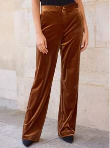 Pantalon long en velours pour femmes avec un design large, une fermeture à boutons et des poches fonctionnelles. Élégant et polyvalent, parfait pour le travail, les rendez-vous romantiques et les rassemblements de vacances