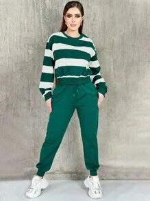 Damskie spodnie w kratę casualowe ze swetrem z okrągłym dekoltem, dzianina poliestrowa, wygodny krój z kieszeniami, odpowiednie na jesienno-zimowy styl kurortowy