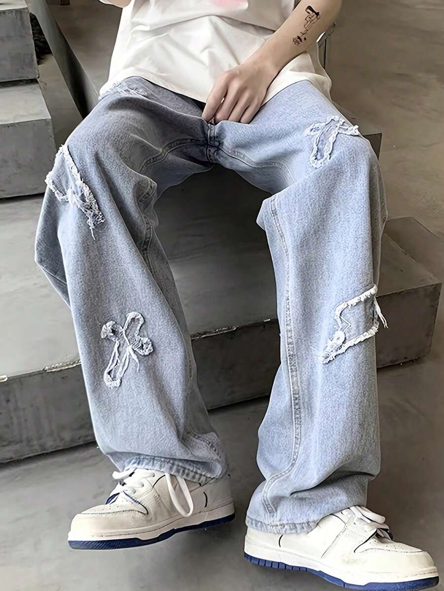 Pantalones vaqueros de mezclilla azul claro con parche bordado de relámpago desgastado para adolescentes chicos - Lavado ligero - Ver 1