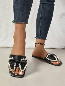 2024年夏季新款蝴蝶结低跟珍珠凉鞋，女士甜美优雅平底沙滩鞋，大码，度假拖鞋 - 黑色 - 查看 4