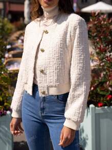 Veste courte en tweed à paillettes et col rond pour femme – Design sophistiqué et minimaliste, parfaite pour toutes les occasions : travail, événements formels ou rendez-vous romantiques.