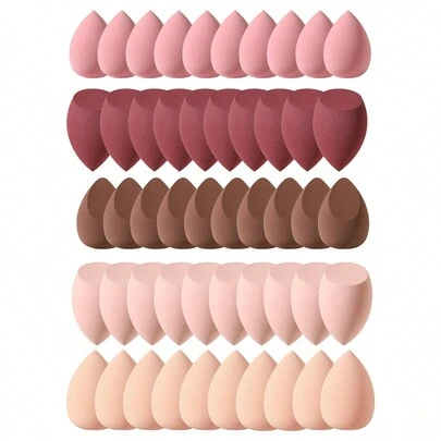 50个/套化妆海绵套装，美妆蛋，专业美妆海绵批发，柔软遮瑕海绵，粉底、散粉、爽肤水等化妆工具，价格实惠，可用于房间装饰、梳妆台、旅行、卧室等场合，是化妆配件的理想之选。产品标签：粉扑、美妆蛋、粉扑、化妆海绵、价格实惠，适合作为圣诞礼物、化妆品、化妆工具、廉价好物、礼品、女士礼品、圣诞礼物、赠品、旅行必备。