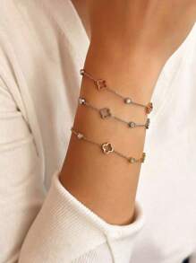 TONSI 1件18K镀金时尚优雅镂空四叶草手链，镶嵌人造锆石，钛钢材质，镀18K金，低过敏性钛钢材质，适合女性日常聚会、派对和节日场合佩戴。 - 彩色 - 查看 2