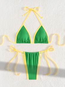 Top bikini con incrocio sulla schiena a costine semplici e slip bikini con lacci laterali, adatto per vacanze estive in spiaggia