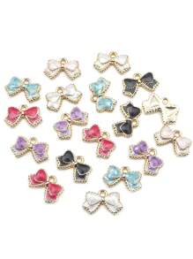 10 pièces Charmes de nœud en émail, pendentifs de nœuds papillon de couleurs assorties, mini nœuds papillon mignons pour artisanat DIY, bracelets, colliers, boucles d'oreilles, accessoires de bijouterie