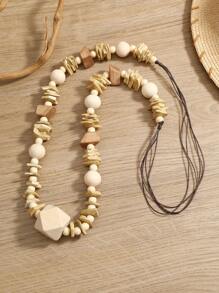 Collier long fait main style bohème en coque de noix de coco et bois, mode polyvalente