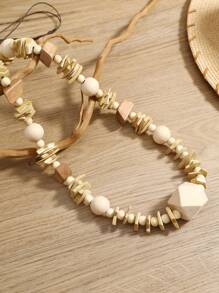 Collier long fait main style bohème en coque de noix de coco et bois, mode polyvalente
