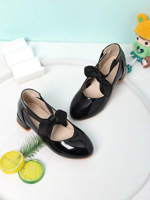 2025 Noworoczna limitowana edycja żeńska dziecięca francuska mała księżniczka kokarda jasny blask dziecięce wysokie obcasy wdzięczne Marie Jean Princess wysokie obcasy codzienne podróże studenckie wysokie obcasy w połączeniu z odzieżą imprezową kwiatowe formalne stroje dziecięce wysokie obcasy buty odpowiednie do występów baletowych młodzieżowe czarne wysokie obcasy