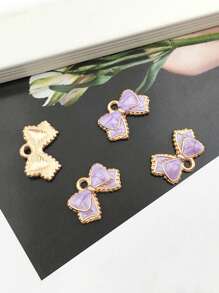 10 pièces Charmes de nœud en émail, pendentifs de nœuds papillon de couleurs assorties, mini nœuds papillon mignons pour artisanat DIY, bracelets, colliers, boucles d'oreilles, accessoires de bijouterie