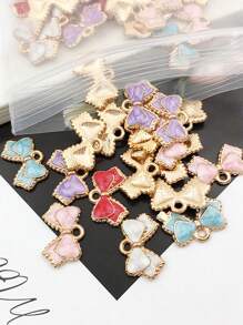 10 pièces Charmes de nœud en émail, pendentifs de nœuds papillon de couleurs assorties, mini nœuds papillon mignons pour artisanat DIY, bracelets, colliers, boucles d'oreilles, accessoires de bijouterie