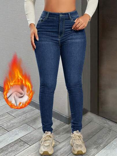 高腰弹力猫须破洞修身锥形牛仔裤