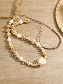 Collier long fait main style bohème en coque de noix de coco et bois, mode polyvalente