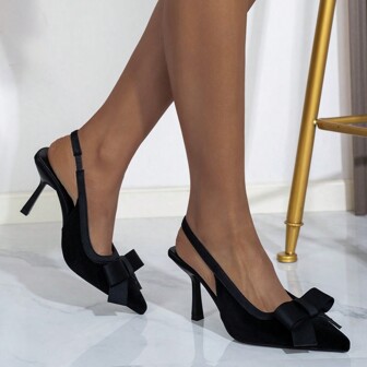 Damskor med hög klack, spetsiga tå, svarta pumps med sammetseffekt och rosett bakre rem, moderiktiga kvällsfestskor, alla hjärtans dag-skor