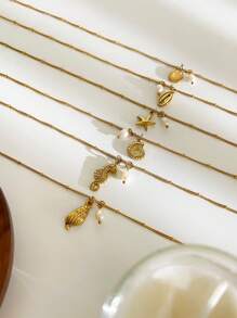 Monlansher Nuova collana alla moda in acciaio inossidabile con pendente a tema marino per donne, caratterizzata da vari elementi marini come conchiglie, cavallucci marini, stelle marine, tartarughe, decorata con perle d'acqua dolce, elegante e versatile per l'uso quotidiano