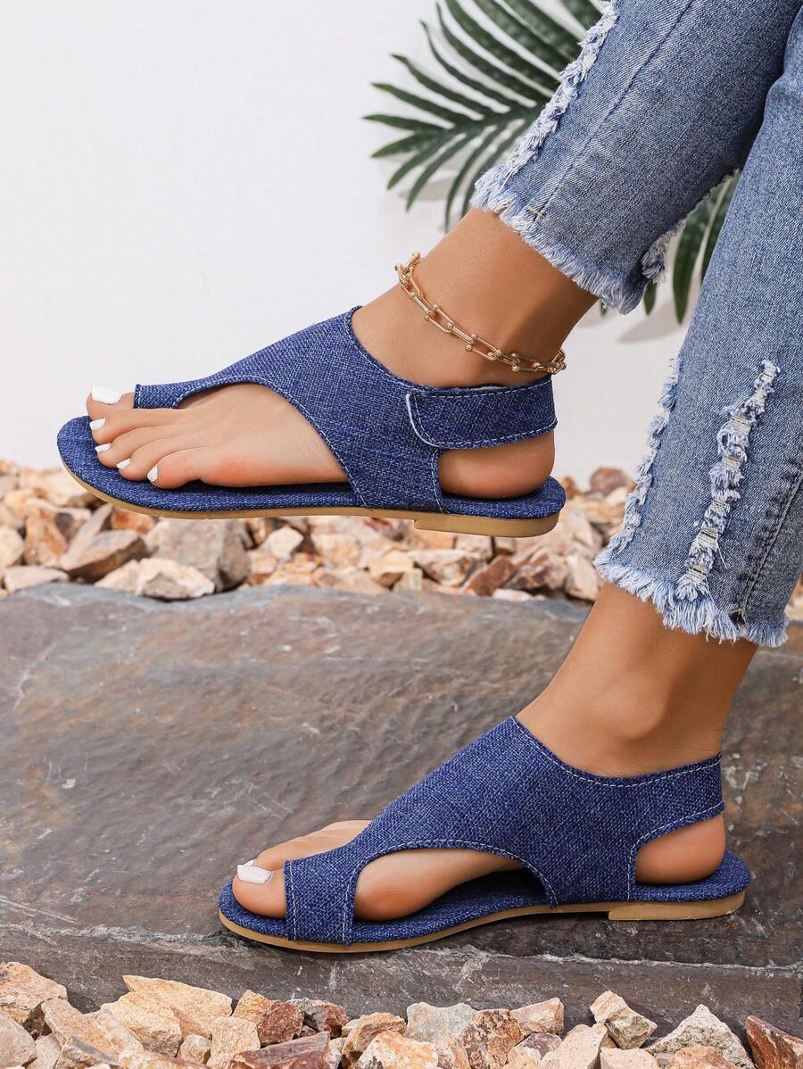 Dép xăng đan đế bằng kiểu Bohemian màu xanh dương dành cho nữ, thiết kế khóa dán, kiểu dáng thời trang Âu Mỹ, họa tiết hoa hướng dương, thoải mái, thoáng khí, thích hợp cho du lịch, nghỉ lễ, đi biển, phối đồ mùa xuân hè.