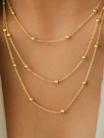 Collar minimalista de cadena ajustable con múltiples cuentas de oro en capas, adecuado para regalos, reuniones, atuendos y uso diario