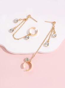 1 paire de boucles d'oreilles dorées style hip hop avec chaîne de strass à gland clip sur l'oreille
