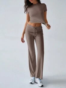 Conjunto de dos piezas de ropa deportiva casual de estilo Y2K para mujer, de unicolor, con camiseta de manga corta y cuello redondo, y pantalones rectos de pierna estrecha para el otoño