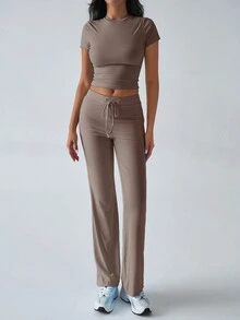 Conjunto de dos piezas de ropa deportiva casual de estilo Y2K para mujer, de unicolor, con camiseta de manga corta y cuello redondo, y pantalones rectos de pierna estrecha para el otoño