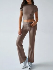 Conjunto de dos piezas de ropa deportiva casual de estilo Y2K para mujer, de unicolor, con camiseta de manga corta y cuello redondo, y pantalones rectos de pierna estrecha para el otoño