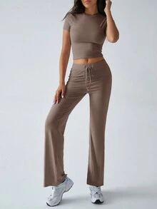 Conjunto de dos piezas de ropa deportiva casual de estilo Y2K para mujer, de unicolor, con camiseta de manga corta y cuello redondo, y pantalones rectos de pierna estrecha para el otoño