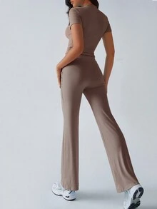 Conjunto de dos piezas de ropa deportiva casual de estilo Y2K para mujer, de unicolor, con camiseta de manga corta y cuello redondo, y pantalones rectos de pierna estrecha para el otoño