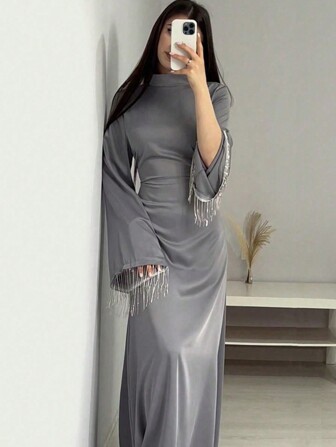 女式立领喇叭袖抽绳腰长款阿拉伯风格连衣裙