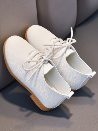 1 paire de chaussures plates de couleur unie classique pour enfants, légères et stylées, antidérapantes et résistantes à l'usure, convenant au printemps et à l'automne