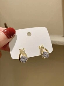 1 paire de boucles d'oreilles de luxe à la mode avec zircone en forme de goutte d'eau et design croisé. Conception haut de gamme exquise, convient