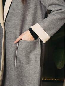 时尚休闲口袋中长外套