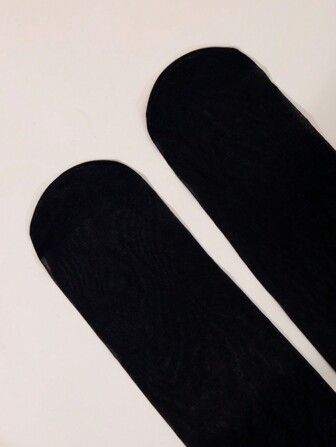 1双黑色超薄性感防刮连裤袜，适合秋夏季节穿着，舒适保暖