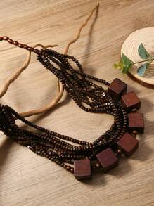 1 pieza Collar largo tipo cadena de jersey de estilo bohemio vintage con patrón de madera de coco, accesorio de viaje