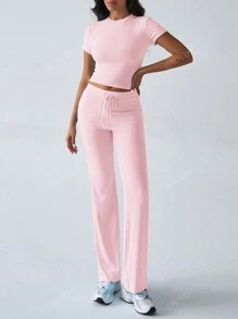 Conjunto de dos piezas de ropa deportiva casual diaria de unicolor de manga corta y cuello redondo, pantalones rectos delgados y largos para mujer en otoño Y2K