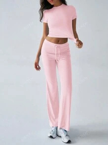 Conjunto de dos piezas de ropa deportiva casual diaria de unicolor de manga corta y cuello redondo, pantalones rectos delgados y largos para mujer en otoño Y2K