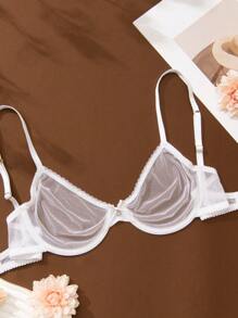 Wingslove 这款白色薄纱无衬垫文胸采用可调节交叉肩带和透气网眼面料，兼具女性柔美透视风格和舒适贴合的穿着体验。无论是搭配时尚服饰还是日常穿着，都能完美契合，是需要可调节、优雅内衣人士的理想之选！ - 白色 - 查看 6