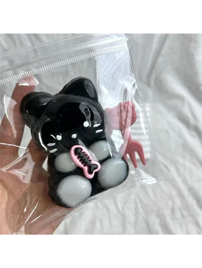 1 件黑色可爱猫吃鱼设计柔软的玩具，缓解压力，逼真的挤压玩具