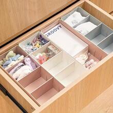 Une boîte de rangement à compartiments pour tiroir, une boîte de rangement de coiffeuse à combinaison libre, une petite boîte de tri à compartiments, une boîte de rangement pour cosmétiques en plastique pour le bureau. Accessoires pour la salle de bain, la chambre, le salon, le bureau et le dortoir. Fournitures d'organisation et de stockage pour la maison - Multicolore - Voir 1