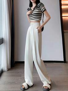 Quần nữ màu trơn, cài hai nút phía trước, dáng ôm, xếp ly, kiểu dáng thường ngày, màu trắng thanh lịch, thích hợp cho mùa xuân. - trắng - Xem 5