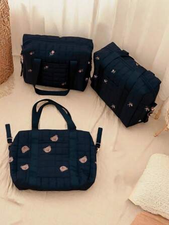 1 pieza Bolso de mamá sólido negro con bordado lindo, con bolsillos, ganchos duales para cochecito, bolso portátil para pañales y artículos de alimentación, adecuado para todas las estaciones