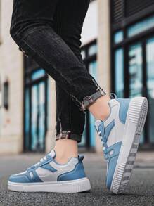 男士字母休闲运动鞋皮面拼接个性撞色轻便户外防滑平底运动鞋