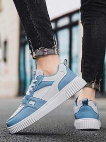 男士字母休闲运动鞋皮面拼接个性撞色轻便户外防滑平底运动鞋