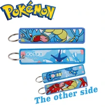 pocket monsters 1 pièce Porte-clés de personnage de dessin animé, pendentif brodé élégant, accessoire de mode et cadeau pour hommes et femmes. Accessoire de voiture, charm de sac à dos pour l'école