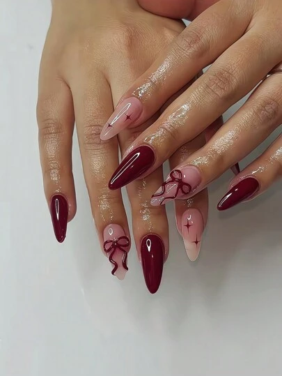 24 uñas postizas de almendra de color vino tinto con decoración de cometa y lazo, efecto brillante, incluye 1 pieza de gel de gelatina y 1 pieza de lima para uñas. La mejor opción para que las mujeres muestren su belleza. Adecuado para ocasiones casuales, de fiesta y formales. Suministros de arte de uñas