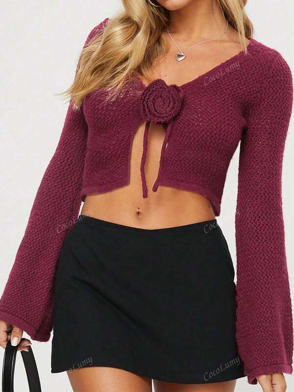 Cardigan intagliato sexy e romantico da donna, con motivo floreale a rilievo lavorato a maglia