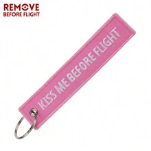 REMOVE BEFORE FLIGHT 1 pieza Llavero casual de fibra de poliéster con bordado de letra "Quitar antes de vuelo" Accesorio de coche Encanto de bolso Escuela Lindo Gótico Y2k Cordón de identificación con soporte de coche Accesorio de bolso Encantos
