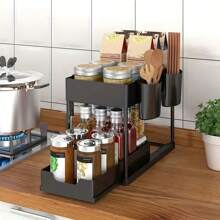 Organizador deslizante de 2 niveles con canastas, bastidor de almacenamiento con ganchos para colgar tazas, organizador de baño y cocina debajo del fregadero